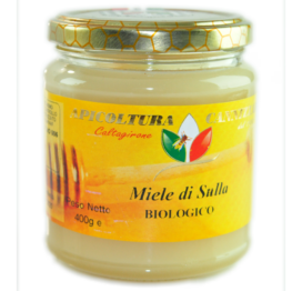 glazen honingpot met geel orange etiket miele di Sulla